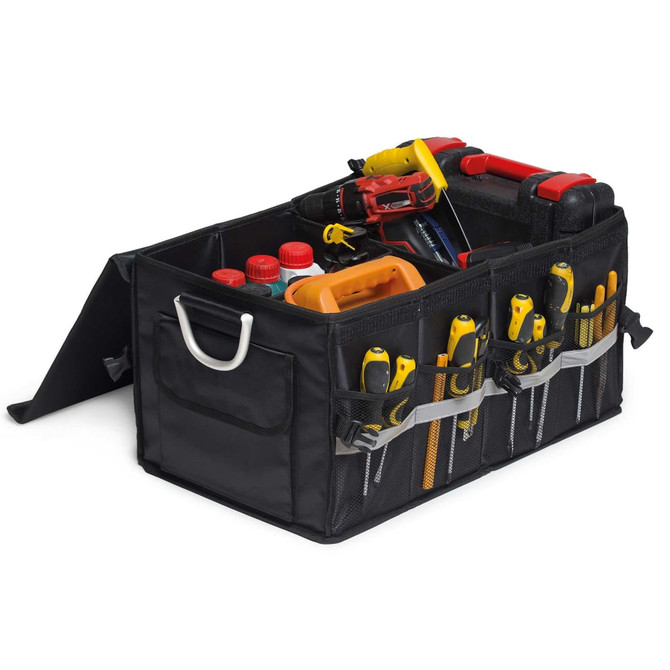 A black organiser featuring multiple compartments, holding tools, bottles, and a cordless drill.