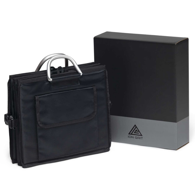A black gear organiser with a handle, accompanied by a sleek black box featuring a logo.