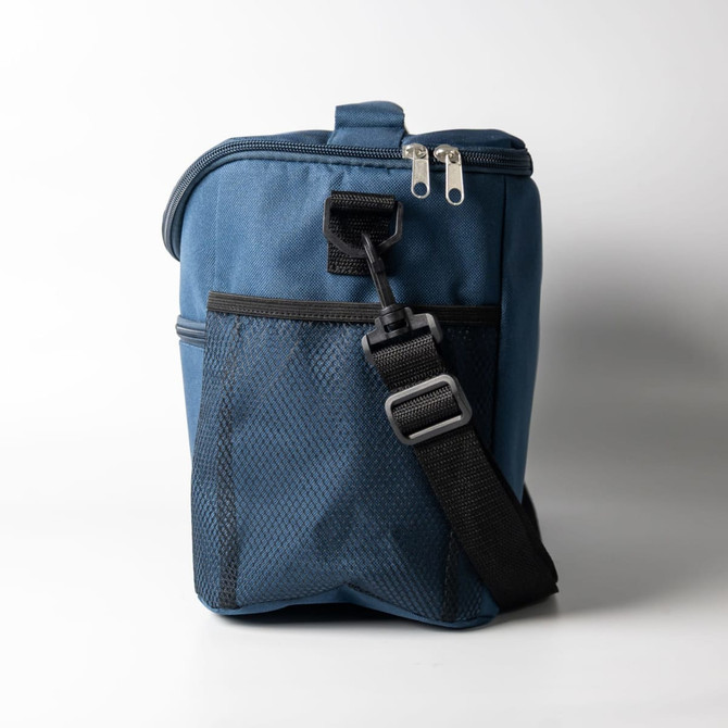A blue cooler bag with a front mesh pocket and adjustable strap, featuring a zippered top and a logo.