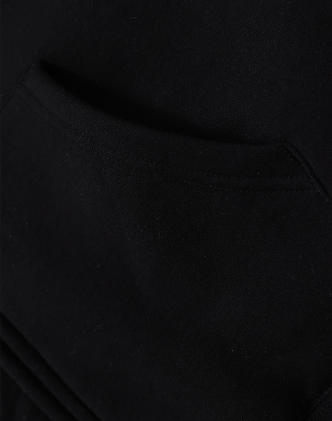 A close-up view of a black men's full-zip fleecy hoodie featuring a front pocket and a soft texture.