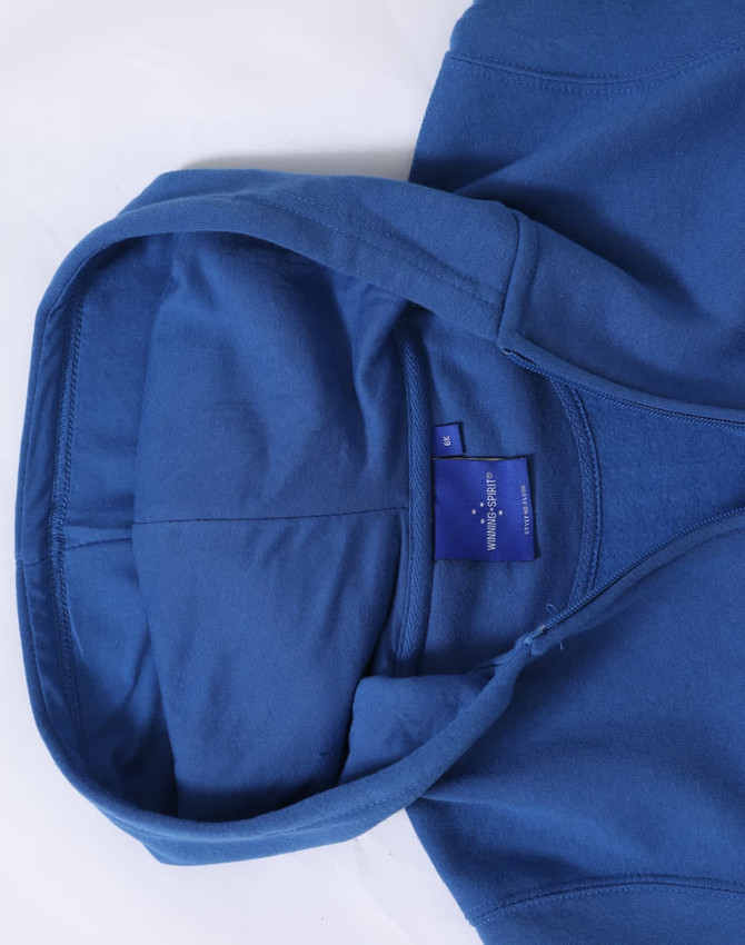 A blue full-zip fleecy hoodie with a spacious hood and a label inside.