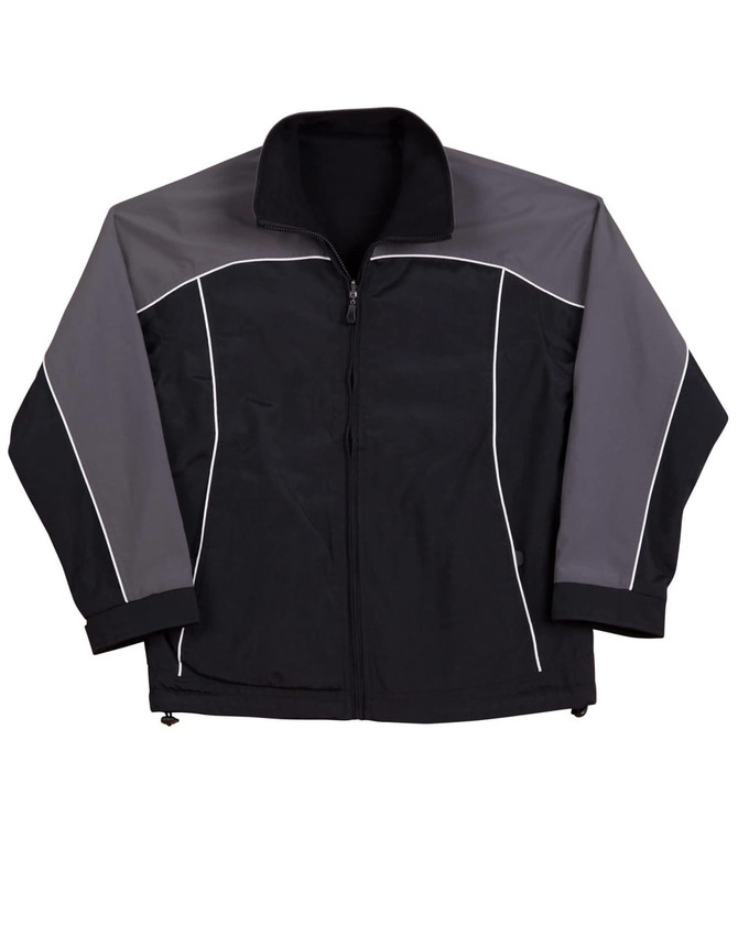 A black and grey reversible jacket with white contrast stitching and a zip closure. It features a logo on the chest.
