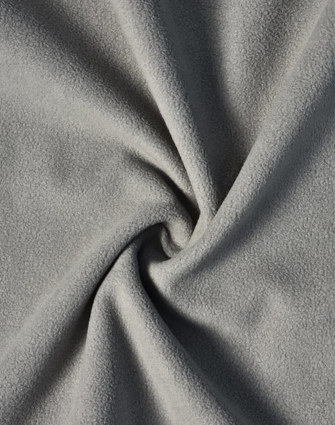 A textured, soft grey fabric featuring a smooth, fleece-like surface. Perfect for jackets and outerwear.