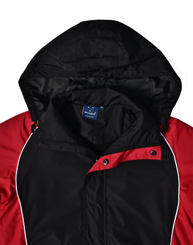 A unisex jacket featuring a black body with red accents and a hood, displaying a label inside.