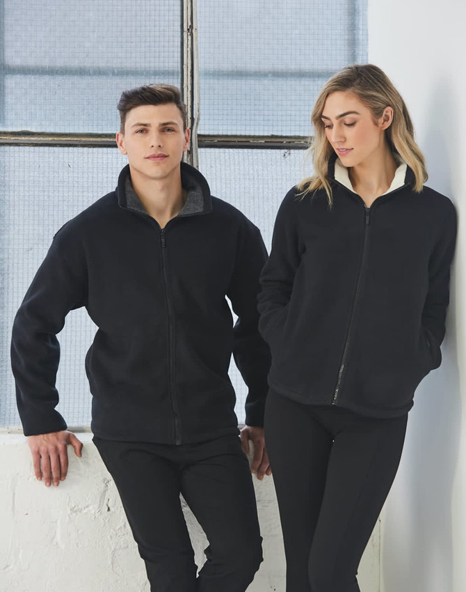 A polar fleece jacket in black, featuring a zip-up front, worn by a man and a woman. The image includes branding.