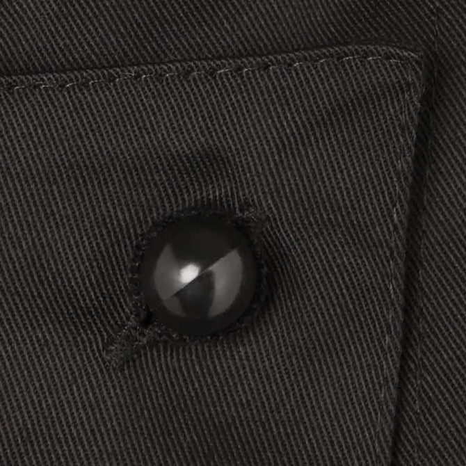 A close-up of a black button on dark fabric, part of a clothing accessory. Features visible stitching and texture.