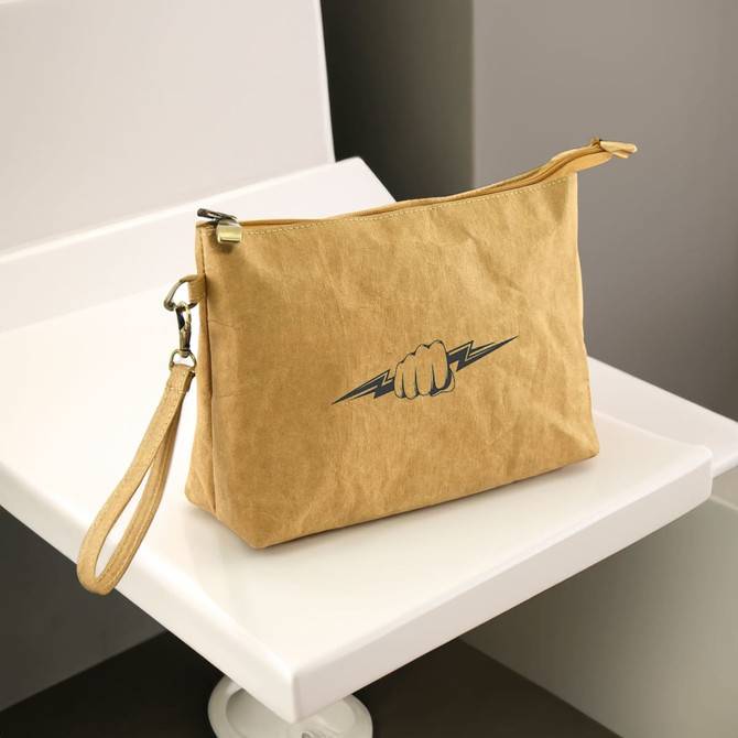 A tan Kraft paper cosmetic bag featuring a logo design, with a zip closure and a wrist strap.