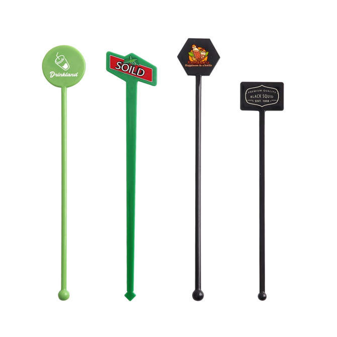 A collection of four drink stirrers in green and black, featuring various designs and a logo on one.