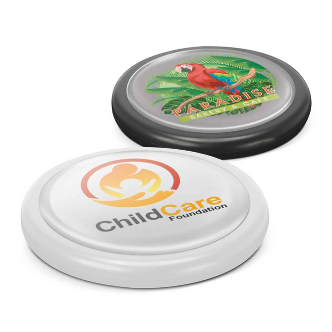 Two wireless chargers with resin finishes, one white with a logo and one black featuring a parrot design.