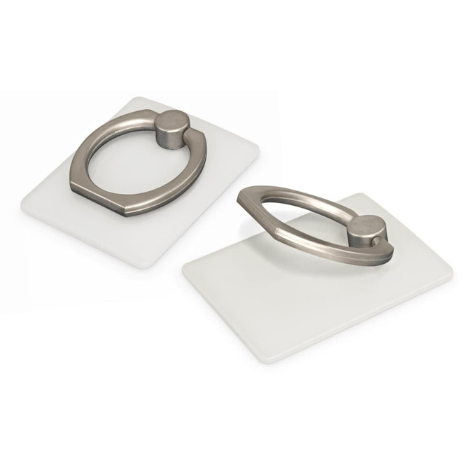 A silver phone grip on a white rectangular base, with a sleek design and a subtle logo visible.