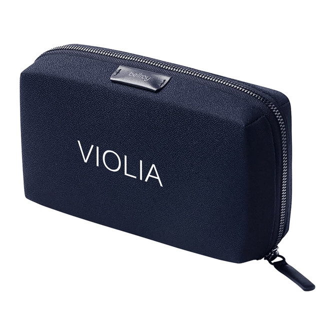 A navy blue tech kit with a zip closure and a logo, featuring a smooth, textured exterior.