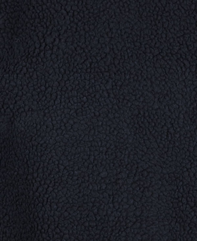A textured black fleece fabric, showcasing a soft, warm surface suitable for hoodies.