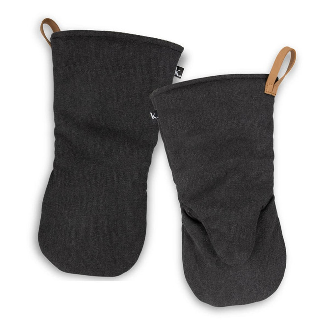 Two black canvas oven mitts with a loop for hanging and a branding label on one.