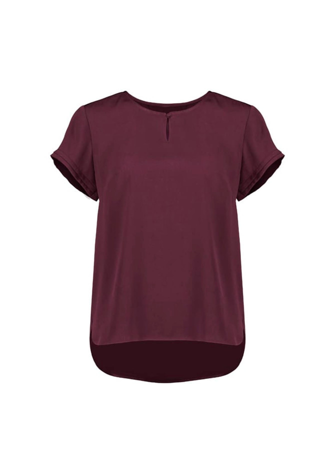 A short sleeve blouse in burgundy with a keyhole detail at the neckline and a rounded hem. It features rolled sleeves and a logo.