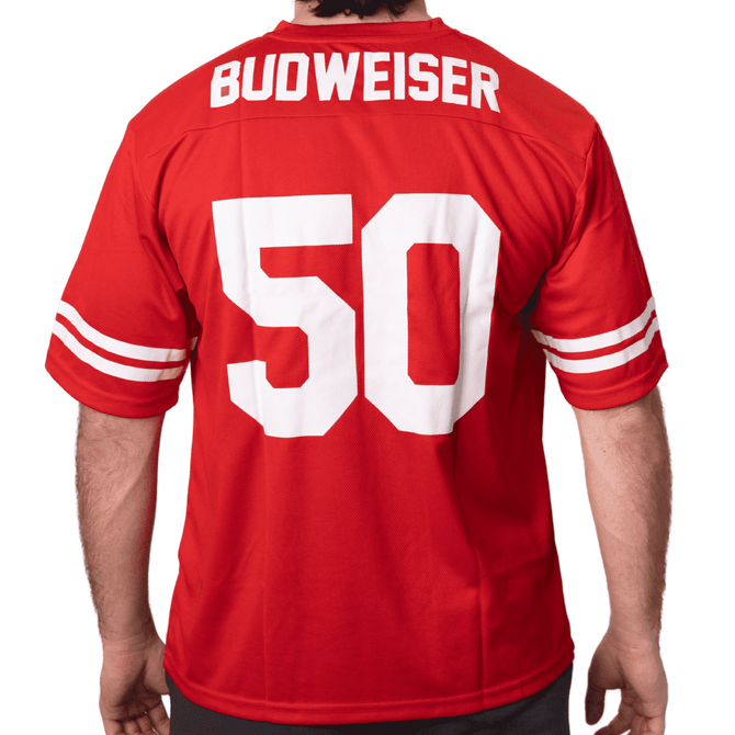 A red NFL jersey featuring a large white number 50 on the back and a logo on the upper section.