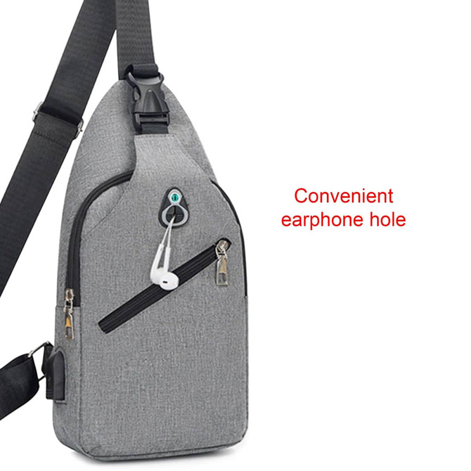 A grey sling chest bag with a zippered pocket and a convenient earphone hole. It features a shoulder strap and a logo.