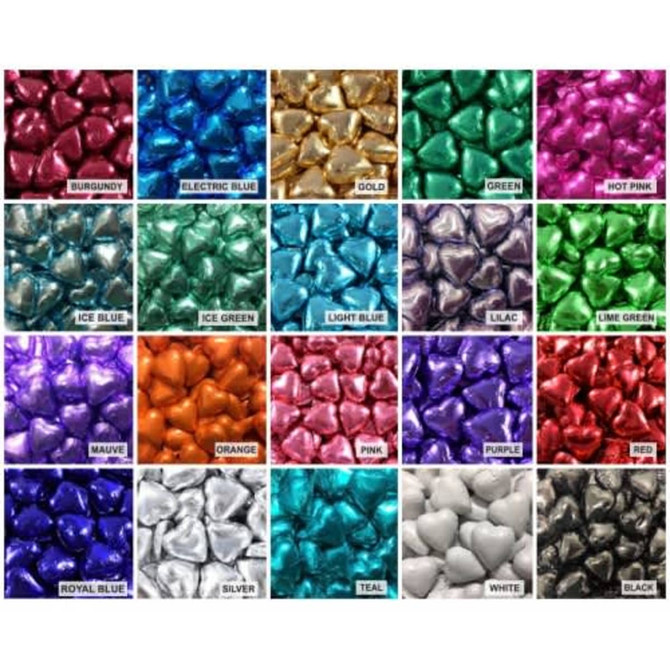 A variety of chocolate hearts in assorted colours, including burgundy, green, gold, and blue, arranged in a grid.