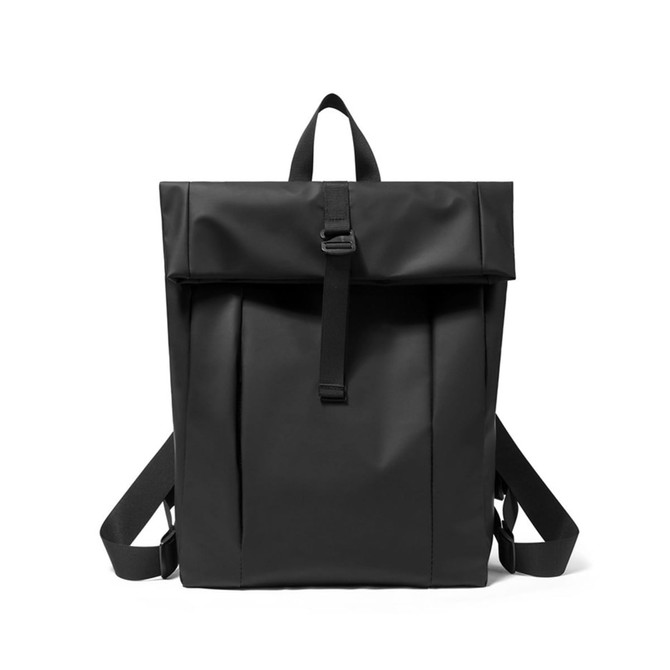 A black tarpaulin roll top backpack with adjustable straps and a secure fastening. Includes branding on the front.