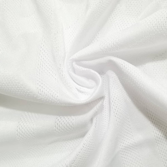 A textured white fabric featuring a breathable and lightweight design, ideal for apparel like t-shirts.