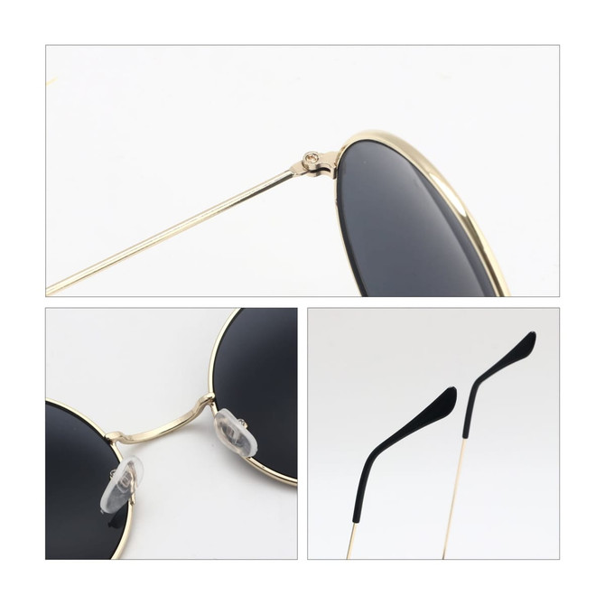 Retro round sunglasses with black lenses and a gold frame, featuring clear nose pads and sleek black arms.