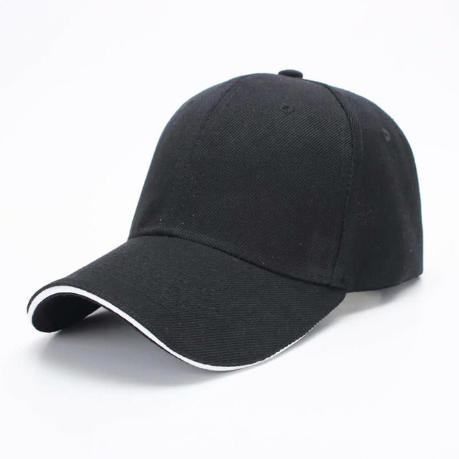 A black cap with a six-panel design and a contrast white trim along the visor, featuring a logo.