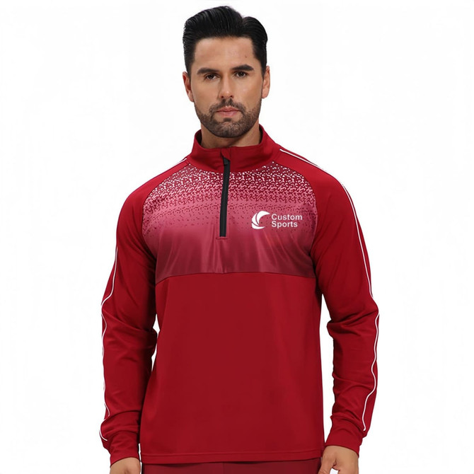 A red polyester spandex raglan jacket with a stand-up collar and quarter-zip, featuring a logo.