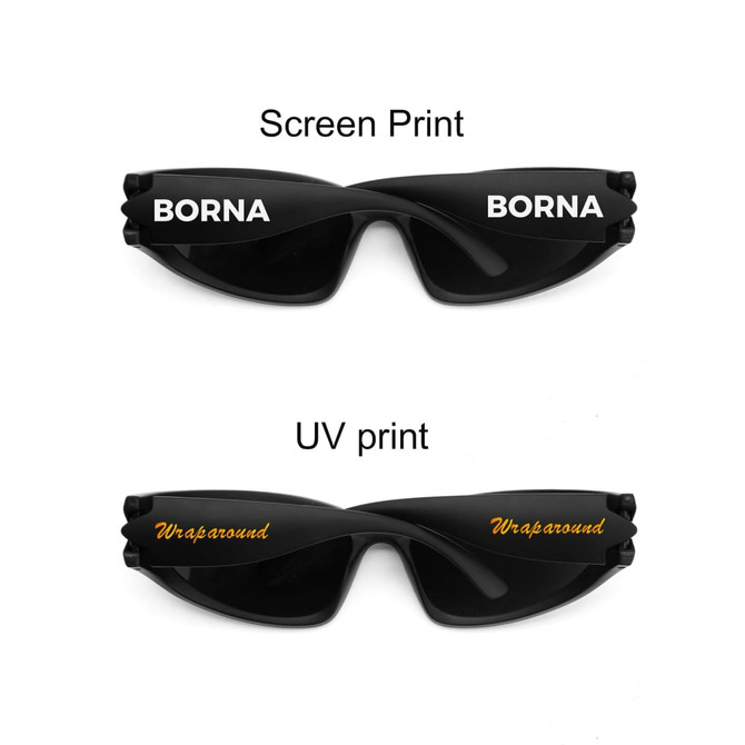 Wraparound sunglasses in black featuring two different print styles on the arms, one in white and one in gold.