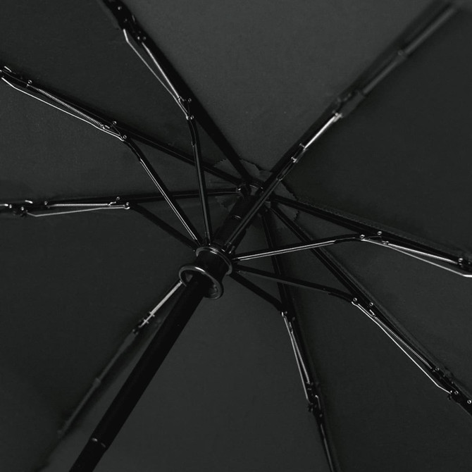 A black recycled tipless umbrella with a sleek design and visible metal framework.