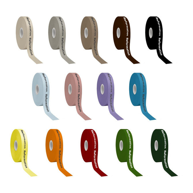 A collection of screen printed satin polyester ribbons in various colours, including brown, pink, purple, yellow, and green. Each ribbon features branding.