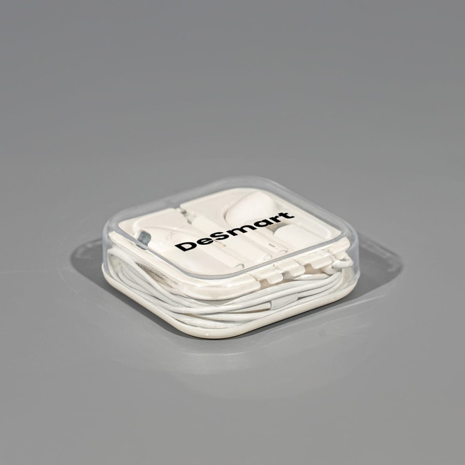 A white USB Type C earphone packaged in a clear case, featuring a logo on the top.
