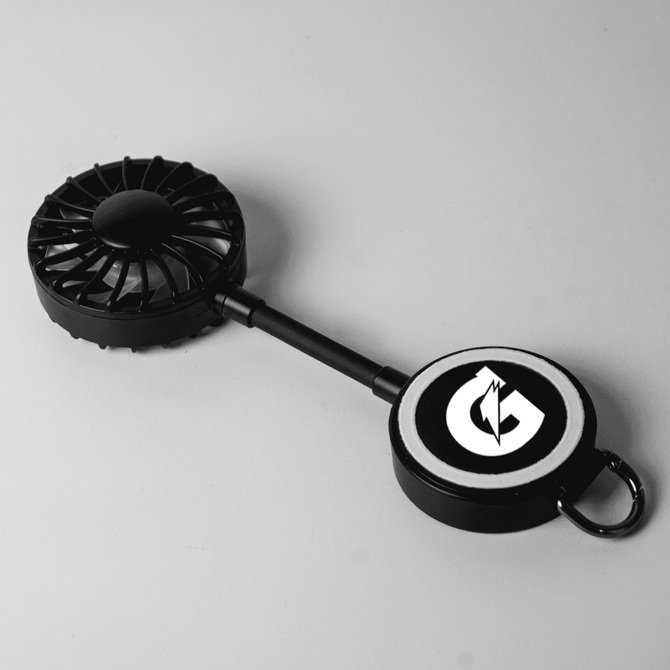 A black 900mAh Type C rechargeable fan with a circular base featuring a logo. Designed for convenient use.