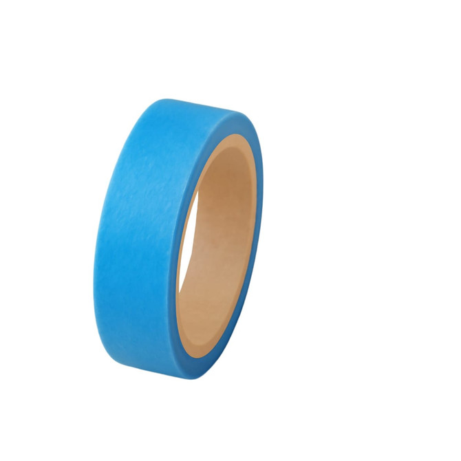 A roll of blue washi tape with a smooth texture and a cardboard core.