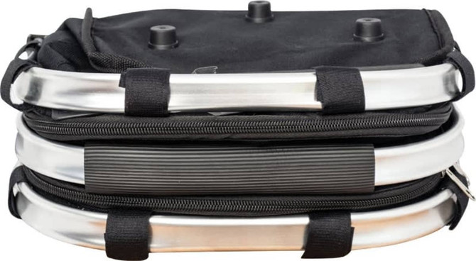 A black Miami Picnic Cooler with silver accents, featuring zippers and straps, displayed in a folded position.