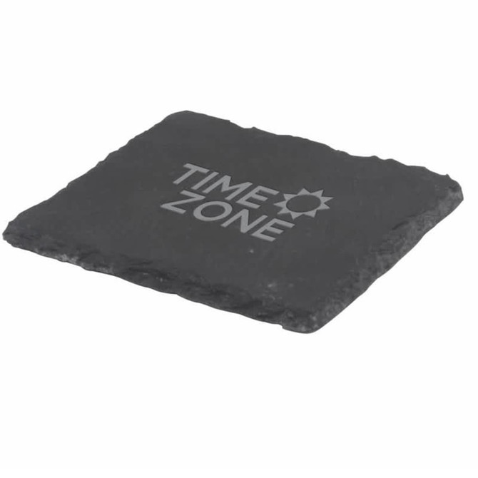A slate coaster in a square shape featuring a logo, with a textured dark grey surface.