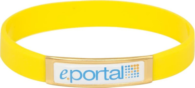 A yellow silicone wristband featuring a rectangular gold plaque with a logo.