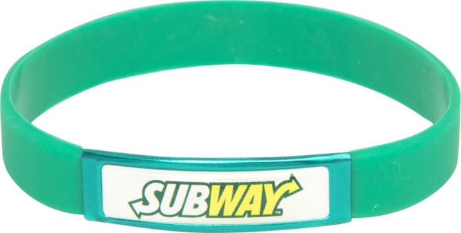 A green silicone wristband featuring a logo insert. Ideal for promotional events and exhibitions.