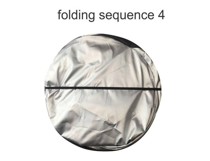 A round, silver sunshade with a black trim, depicting the fourth folding sequence.