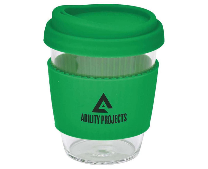 A drink bottle featuring a clear body, green silicone lid, and grip, with a logo on the side.
