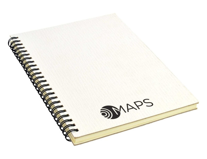 A white A5 notebook with a spiral binding and a logo on the cover, featuring lined pages inside.