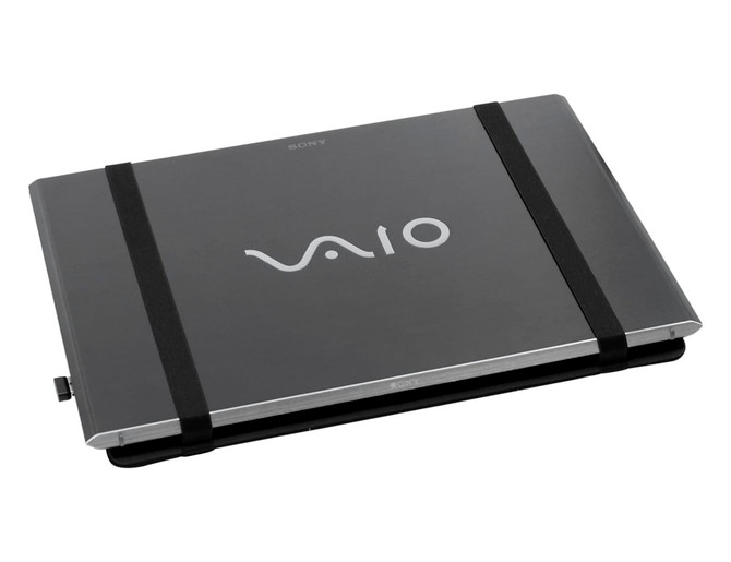 A laptop bag in grey with black straps, featuring a logo on the front.