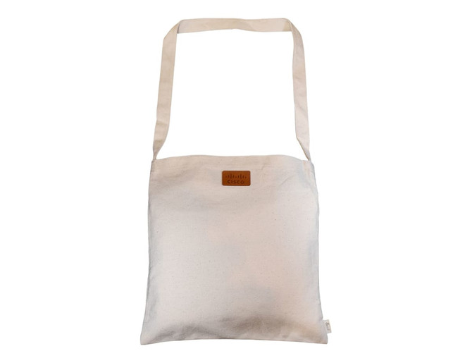 A neutral-coloured tote bag with a long handle and a logo tag. The dimensions are 38x38cm.