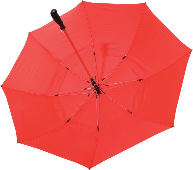 A red deluxe auto golf umbrella with a curved black handle and a sturdy frame. It features a logo on the canopy.