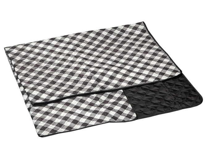 A large picnic rug featuring a black and white checkered pattern with a black quilted section. It has a logo.