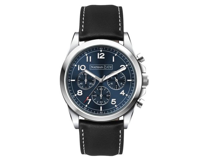 A silver chronograph watch with a blue dial and black leather strap, featuring white stitching and a logo.