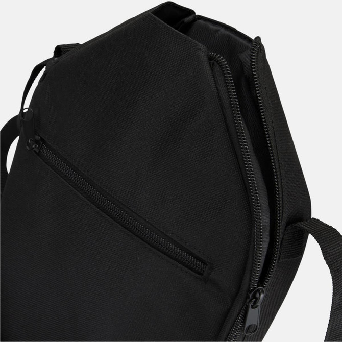 A black bag with a zippered pocket and adjustable straps, featuring a sleek, angular design.