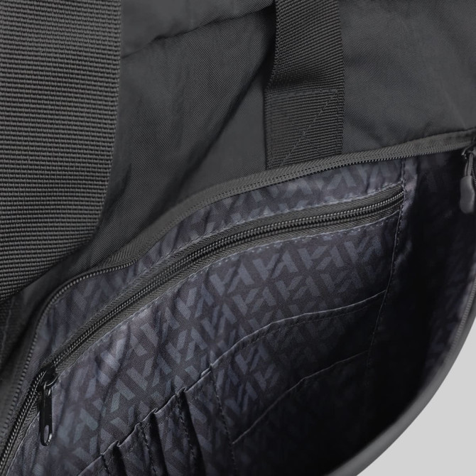 An open black laptop bag interior displaying pocket compartments and a patterned lining. The bag features a branding logo.