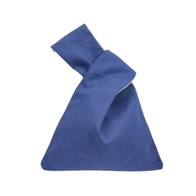 A cotton wrist bag in navy blue with a unique knot design at the top and a branding logo on the surface.