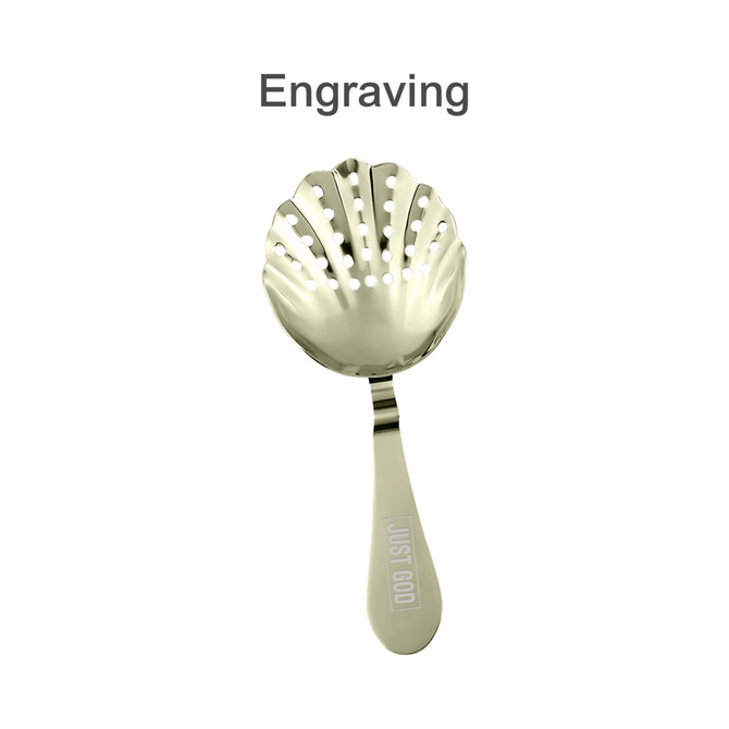 A gold bar strainer with a shell shape, featuring a handle with a logo and numerous holes for straining.