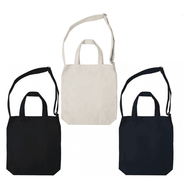 A set of three plain tote bags in black, cream, and navy, featuring handles and a logo on one.