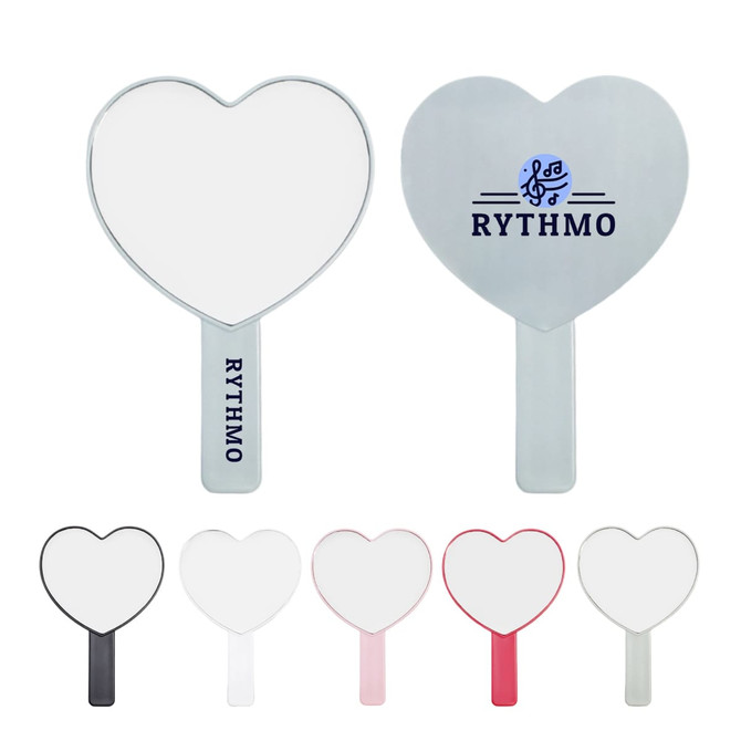 A heart-shaped handheld mirror with a handle available in black, pink, and silver, featuring a logo.
